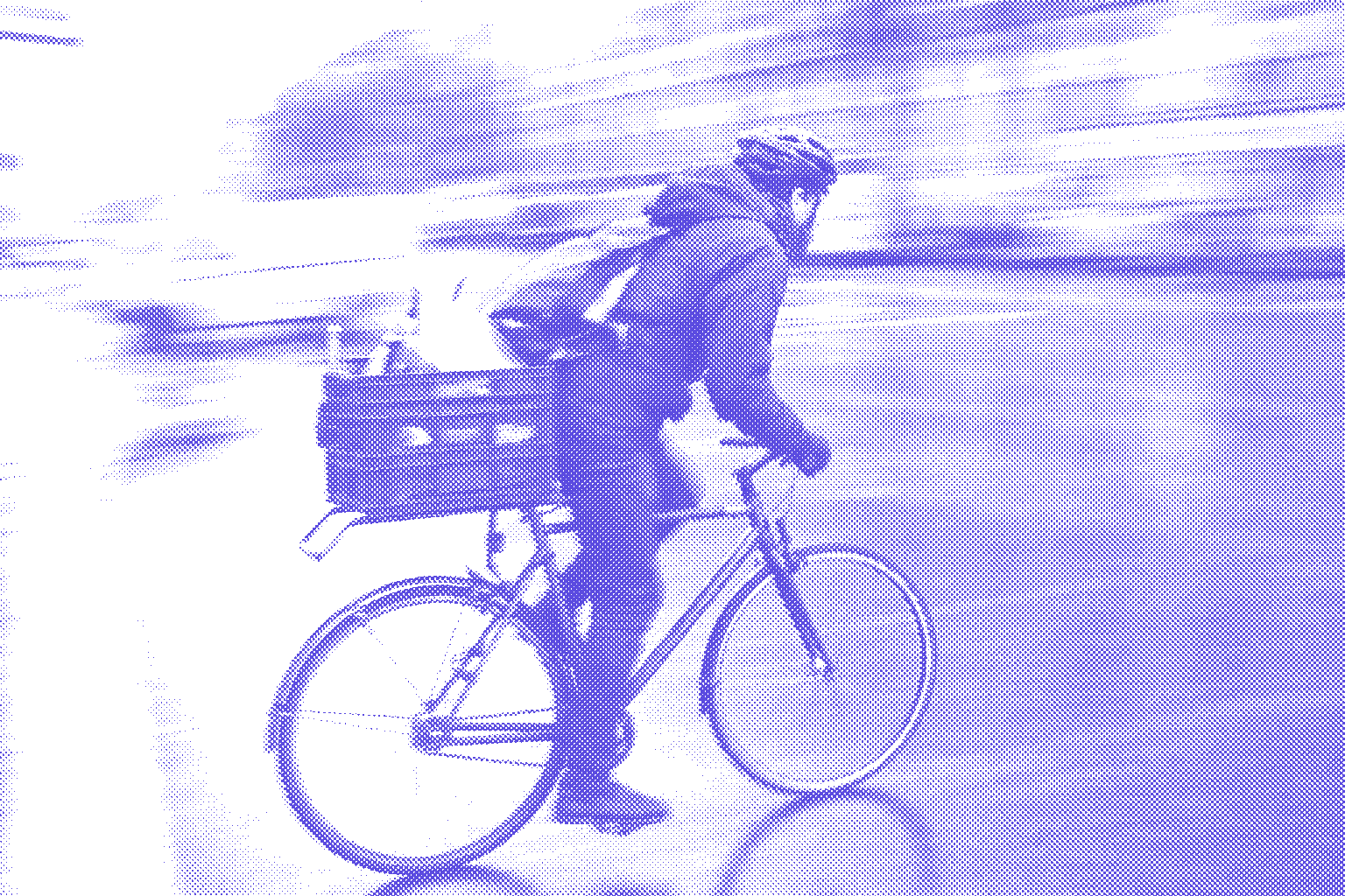 Bicycle courier riding fast with packages, motion-blurred